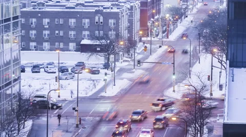 A Downtown Minneapolis Intersection During Rush Hour in Winter 4K Timelapse Video stock 63107051