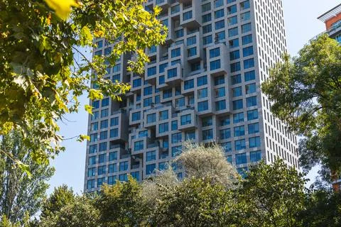 Downtown One Skyscraper Framed by Trees in Tirana Albania Photos