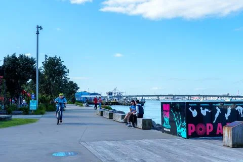 Downtown path and features along coastal harbour edge Stock Photos