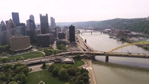 Downtown Pittsburgh Riverfront Park and Yellow Bridge, 4K Stock Footage 201643073