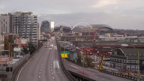 Downtown seattle timelapse at sunset, 99 highway, stadiums Stock Footage 84313859