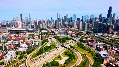 Downtown skyline beyond highway interchange, Chicago, Illinois Stock Footage 341030227