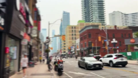 Downtown Toronto street scene featuring bustling city life on Yonge Street. Video stock 344557488
