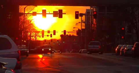 Downtown Traffic at Sunset - 4k Stock Footage 61434858