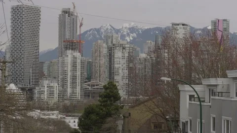 Downtown Vancouver with mountains at background. 스톡 동영상 150344737