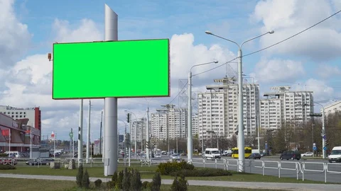 Downtown, view of large green screen billboard on the street near the highway Video stock 129414991