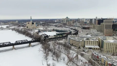 Downtown Winnipeg with moving Train Stock Footage 126933986