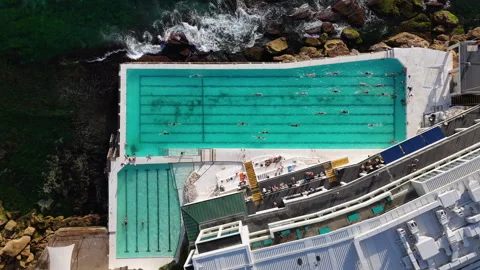 Downward angle drone shot of an ocean pool at Bondi Beach, Australia. Slowly Stock Footage 301064231