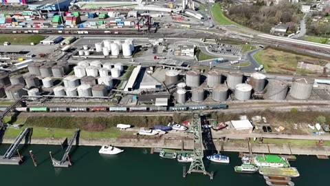 Downward drone view of tanks pipelines and tanker berth Video stock 331896705