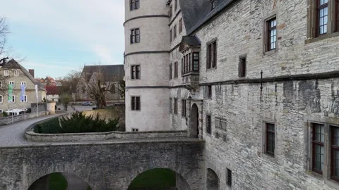 Downward facade tilt over bridge and castle entrance Video stock 331210210