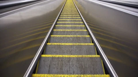 The downward movement standing on an empty escalator Stock Footage 73936158