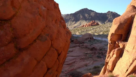 Downward pan of red rocks at sunset. Stock Footage 155318324