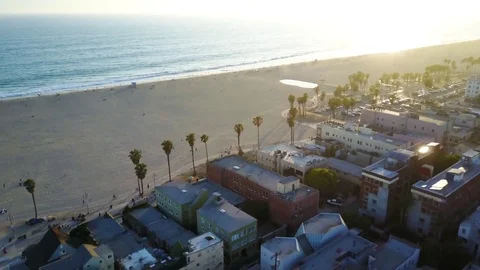 Downward pan of Venice beach California sunset views Stock Footage