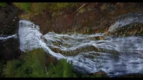Downward pan of a waterfall Stock Footage 72976003