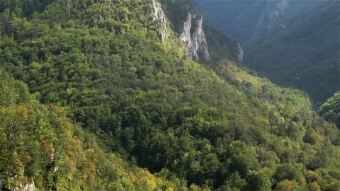 Downward panorama of mountains and river Stock Footage 107181801