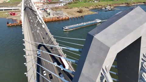 Downward view showing road river and moving traffic Stock-Footage 331201078