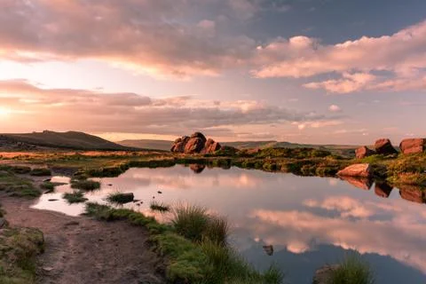 Doxey Pool reflections, and sunset at The Roaches, in the Peak District Natio 스톡 사진