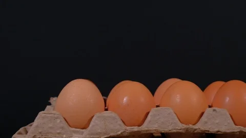 A dozen eggs in a carton Stock Footage 124768784
