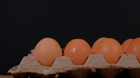 A dozen eggs in a carton Stock Footage 124768788