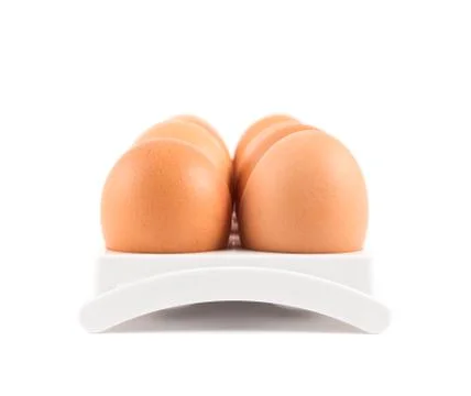 Dozen of eggs in a case isolated Stock Photos