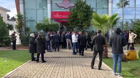 Dozens of Moroccans queue in Rabat to buy tickets for quarter-final against Port Stock Footage 224719701