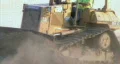Dozer Clears Edge of Road HD Footage