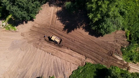 Dozer during clearing forest for construction new road. 動画素材 156626684
