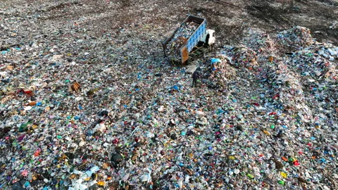 Dozer on Garbage Dump. Landfill with solid household waste, rubbish Video stock 218230373