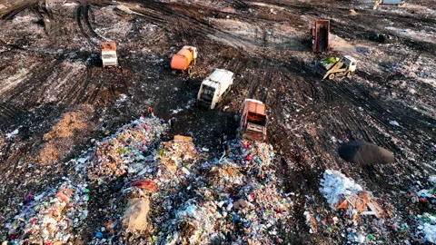 Dozer on Garbage Dump. Landfill with solid household waste, rubbish 스톡 동영상 218230487