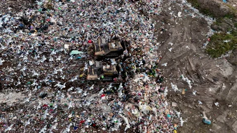 Dozer on Garbage Dump. Landfill with solid household waste, rubbish Vídeo Stock 218454227