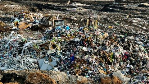 Dozer on Garbage Dump. Landfill with solid household waste, rubbish Vídeos de archivo 218530879