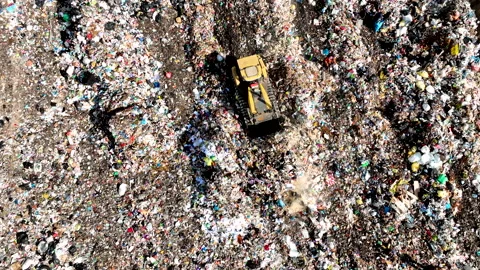 Dozer on Garbage Dump. Landfill with solid household waste Stock Footage 220116177