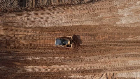 Dozer has been recovering the landscape around the open pit. Video stock 195745980