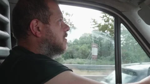 Dozing Off: Truck Driver Falling Asleep at the Wheel, Waking Up Suddenly Video stock 284971644