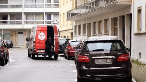 DPD parcel delivery van in central city time-lapse, fast motion Stock Footage 98394307