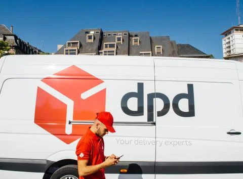 DPD post parcel van delivery with worker Stock Photos