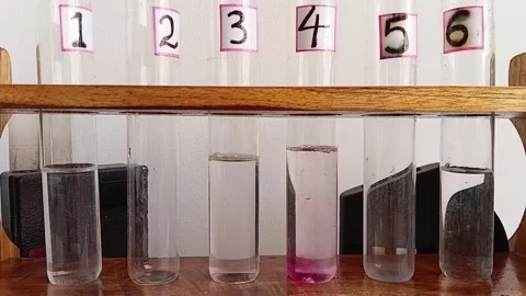 DPD Tablets Dissolving And Bubbling In Water Test Tubes Video stock 334188252