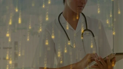 Dr tapping tablet, pulling back revealing steth, scan lines and gold code Stock Footage 328656345