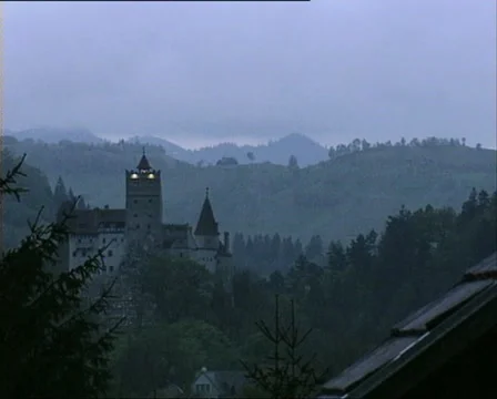 DRACULA CASTLE tilt from clouds 1 Stock Footage