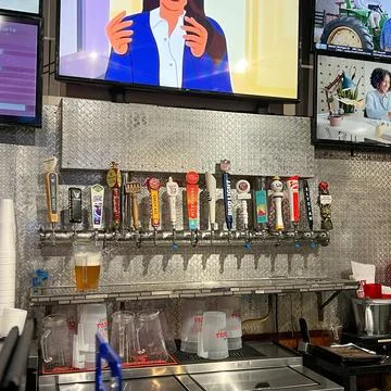 Draft Beer tappers at Coaches Corner Sports Bar and Grill in Savannah, GA. Stock Photos