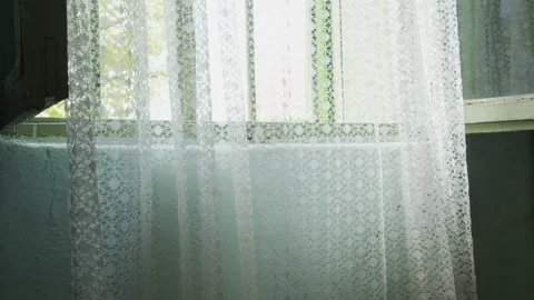 Draft moves old net curtains 4K slow-mo footage Stock Footage 156051567