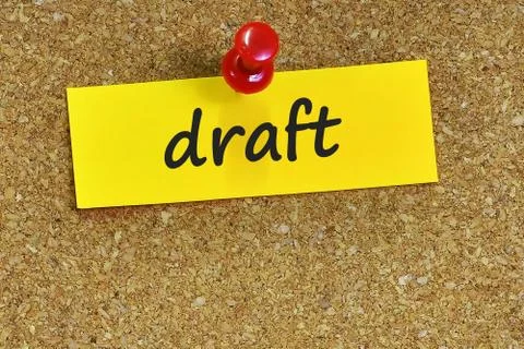 Draft  word on notes paper with cork background Foto stock