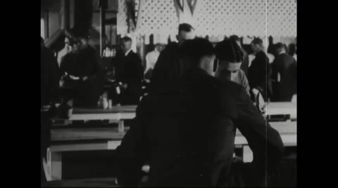 Draftees sitting at dining table with food Stock Footage 43320945