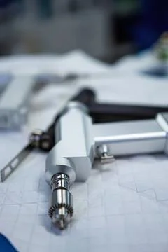 Drafting compass tool on technical drawing paper Stock Photos