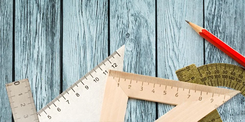 Drafting tools on wooden background Stock Photos