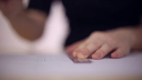 Draftsman draws a pencil on a sheet of paper Stock Footage 72917858
