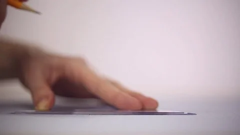 Draftsman draws a pencil on a sheet of paper Stock Footage 72917938