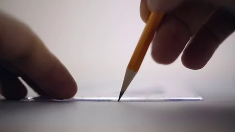 Draftsman draws a pencil on a sheet of paper Video stock 72918193