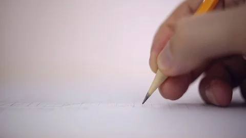 Draftsman draws a pencil on a sheet of paper Stock Footage 72930168