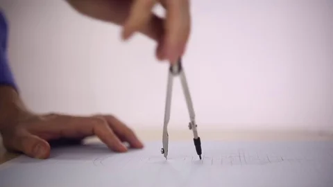 Draftsman uses the compass Video stock 72918171